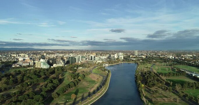 Smooth aerial perspective pan to the right over Albert Park Lake, Melbourne, Australia.