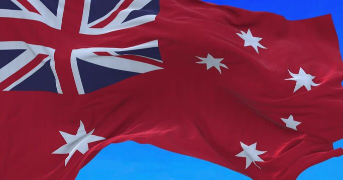 Waving Australian red ensign is the official flag flown at sea by Australian registered merchant ships.