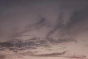 Fototapeta premium Colorful cloudy sky at sunset. Gradient color. Sky texture, abstract nature background