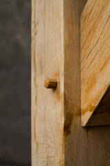 Traditional joinery in wooden architecture -  skilled carpenter work -  connected beam and post in the barn style building.
