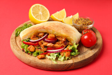 Concept of tasty food with pita with chicken meat
