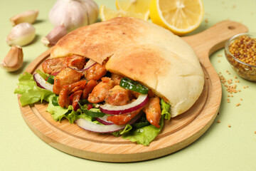 Concept of tasty food with pita with chicken meat