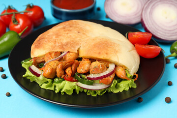 Concept of tasty food with pita with chicken meat