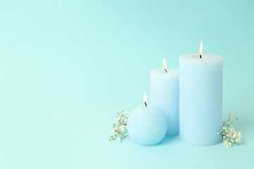 Cozy composition with candles, space for text