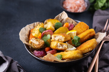 Vegan Plant based fish, fishless fingers with roasted vegetables