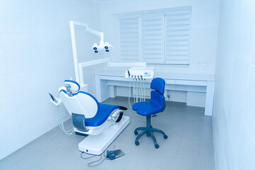 Modern dental office interior with dental chair and tools . Dental Hygiene and Health