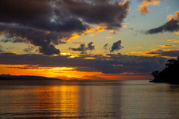Sea, sunset and mountains