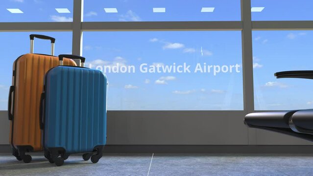 Commercial airplane reveals London Gatwick airport text in the window of terminal