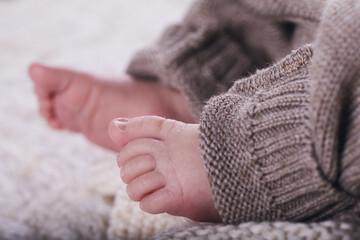 Fototapeta na wymiar Newborn baby feet close up