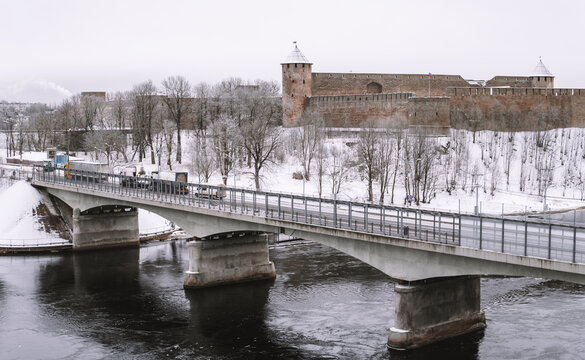 The Russia-Estonia border bridge between Narva and Ivangorod on a cloudy winter day. Estonia