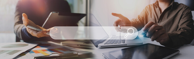 Data Search Technology Search Engine Optimization. man's hands are using a computer notebook to Searching for information. Using Search Console with your website.