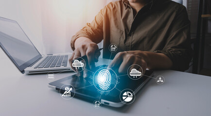 Online transactions, Businessman touching fingerprint scan provides security interface payment shopping banking and cloud computing network connection on virtual screen.