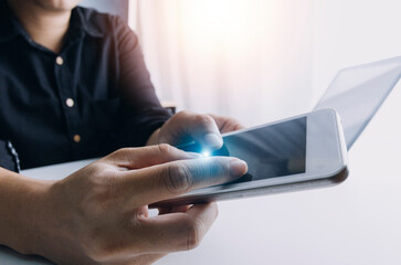 Digital marketing media in virtual screen.business working digital tablet, smartphone with keyboard and computer laptop at office in morning light