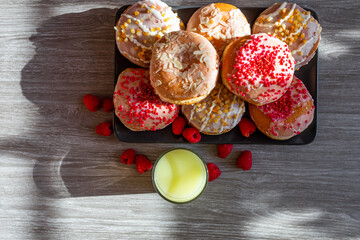 Colorful Donuts with mango and pineapple juice