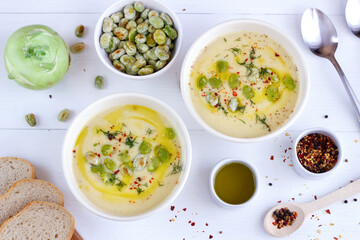 Kohlrabi cream soup with fried broad beans. A healthy vegetarian meal