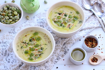 Kohlrabi cream soup with fried broad beans. A healthy vegetarian meal