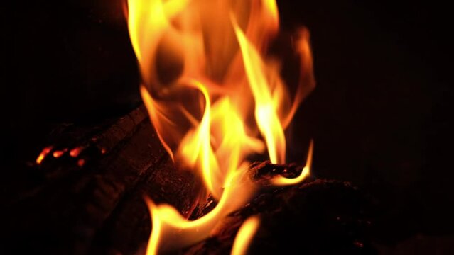 Slow motion video of  fire burning in  stove