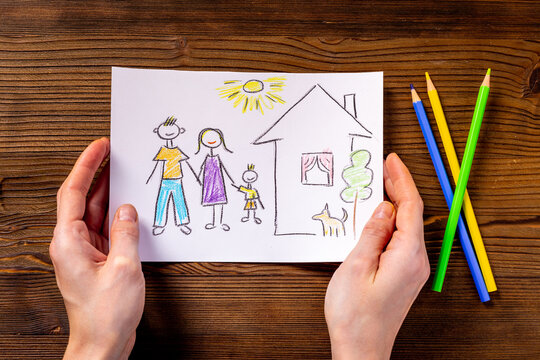 Mortgage concept. Happy family in house - Childrens drawing