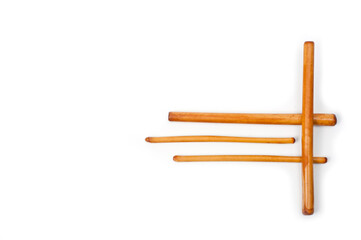 Four bamboo sticks to massage the face and other parts of the body.