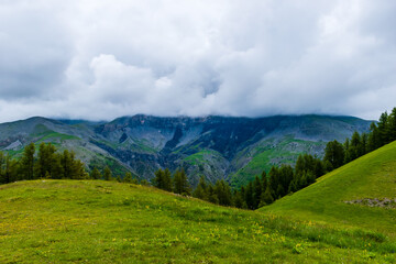 Fototapeta premium A picturesque landscape view of the French Alps mountains on a cloudy summer day (Valberg, Alpes-Maritimes, France)