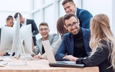 Fototapeta premium portrait of a happy business team at an office Desk