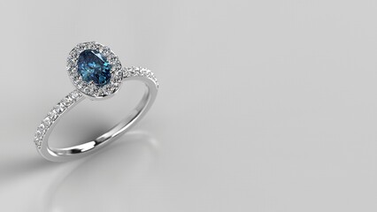 silver or platinum engagement ring with blue white gemstone