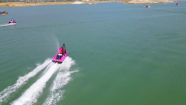 Khanpur Dam is a dam located on the Haro River in Khanpur, Khyber Pakhtunkhwa about 50 km from Islamabad.
A boat running in the dam and parasailing and the Jet ski Ride 