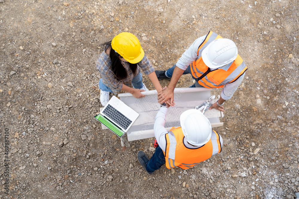 Poster architect,foreman and worker discussing in building construction site in construction site,construct