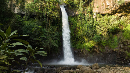 East Java, Indonesia - February 10, 2022 : An exotic view of Jahe's waterfall in Tumpang, Malang, East Java.