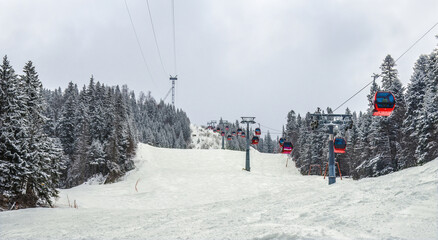 Ski resort in winter - cable cars , gondola
