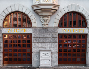 Zug, Switzerland - December 31, 2021: The window of the police station in Zug, Switzerland, with the german inscription Polizei - in translation Police