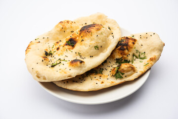 naan, nan bread served in a plate, isolated