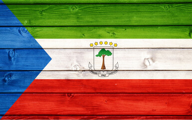 Flag of Equatorial Guinea on wooden surface
