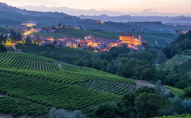 Barolo village illuminated in the evening. Langhe region of Piedmont, Cuneo, northern Italy.	 - obrazy, fototapety, plakaty