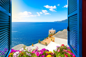Scenic open window view of the Mediterranean Sea from a room along the Amalfi Coast near Sorrento,...