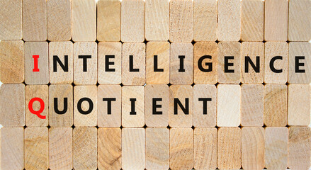 IQ intelligence quotient symbol. Concept words IQ intelligence quotient on wooden blocks on a...