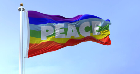 the rainbow flag of peace flying