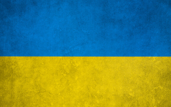 Image of the flag of Ukraine with blue and yellow spots and wrinkled texture