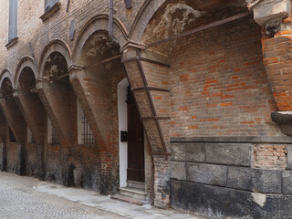 Ferrara, Italy. Medieval house with buttresses.