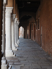 Ferrara, Italy. Colonnade of the fourteenth-century Cana Minerbi Del Sale.