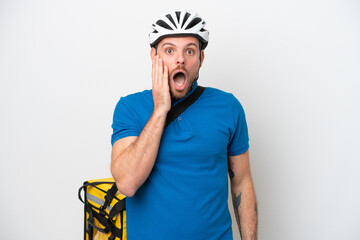 Young brazilian man with thermal backpack isolated on white background surprised and shocked while looking right