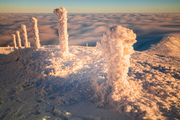 Sunrise on Sněžka in the Giant Mountains. Sněžka is the highest mountain in the Czech Republic with an altitude of 1603 meters