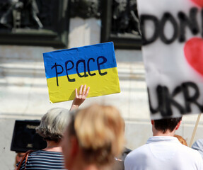 Peace sign on the flag of Ukraine against the war in Ukraine.