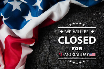 Memorial Day Background Design. American flag on a background of stone wall with a message. We will be Closed for Memorial Day.