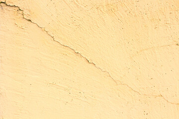 Beige sand color horizontal cracked background.