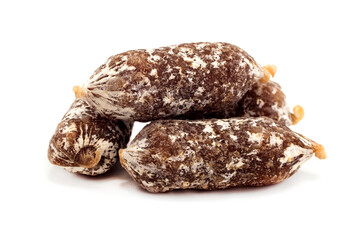 Small smoked sausages with a white coating on a white background. Sausage isolate