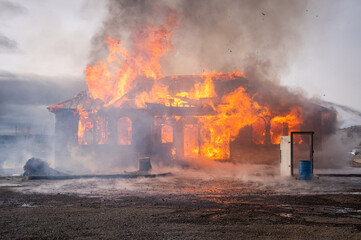 A two-story house fully engulfed structure fire