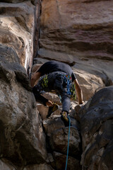 Rock Climber climbing the route Para mis amigos in Suesca Colombia