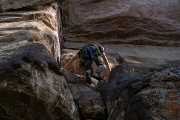 Rock Climber climbing the route Para mis amigos in Suesca Colombia