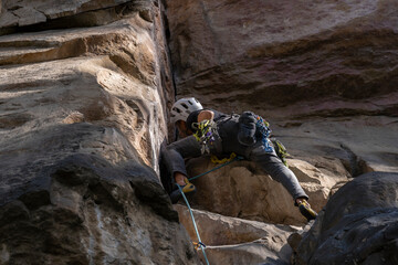 Rock Climber climbing the route Para mis amigos in Suesca Colombia